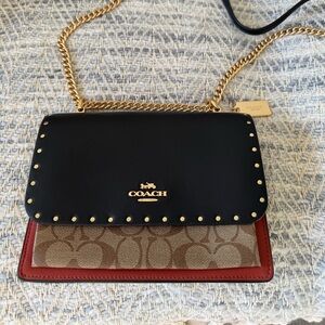 Multi pattern Coach small handbag